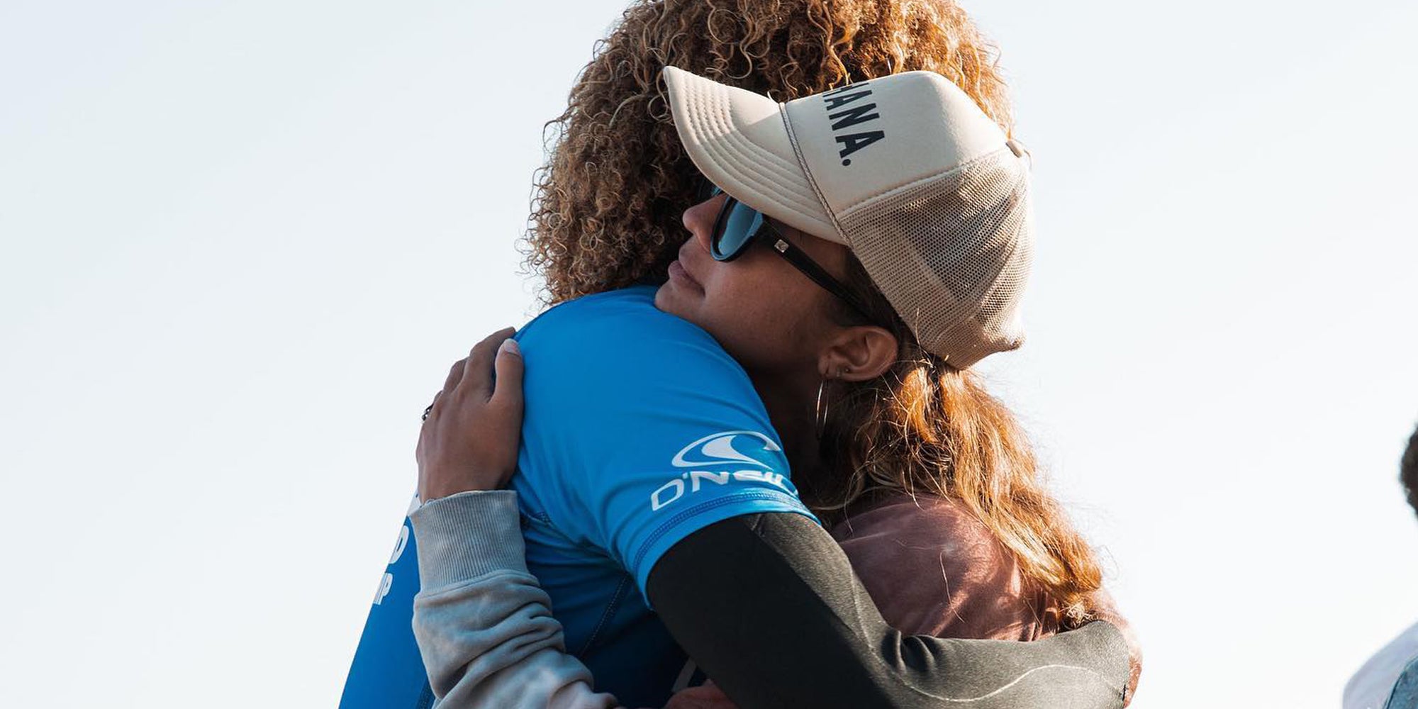 Kani Stewart and Kelis Kaleopa'a hug after they both placed 2nd in the world.