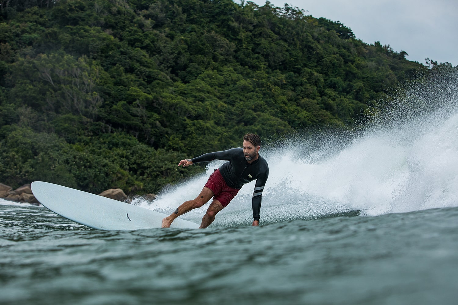 CJ Nelson's powerful bottom turn on his parallax.
